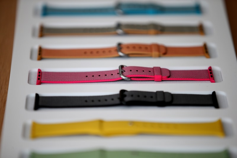 Apple screenless health tracker band concept alongside Apple Watch Series 12
