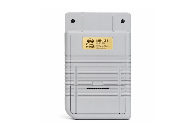 FunnyPlaying FPGB Mini FPGA handheld playing an original Game Boy cartridge on its IPS display