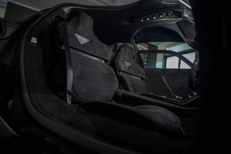 Alfa Romeo 33 Stradale Perla Nera featuring matte black exposed carbon fiber bodywork.
