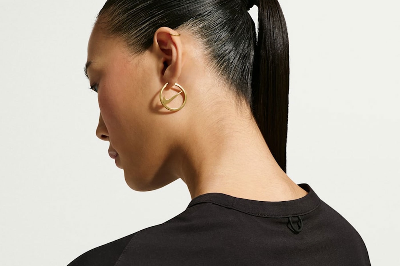 Nike Expands Into Fine Accessories With Official Swoosh Jewelry Collection release info earrings necklaces