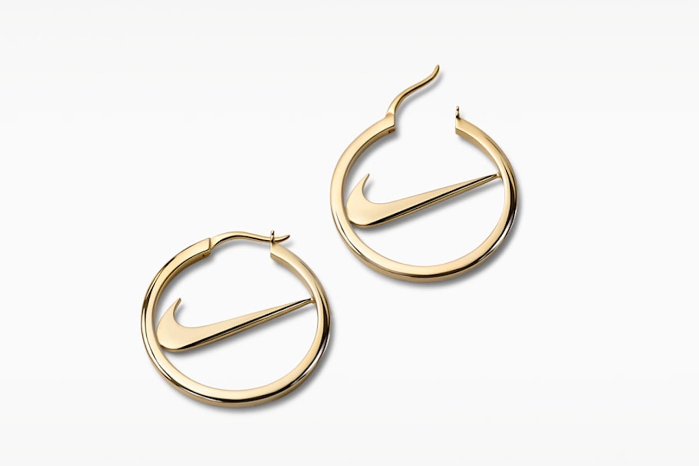 Nike Expands Into Fine Accessories With Official Swoosh Jewelry Collection release info earrings necklaces