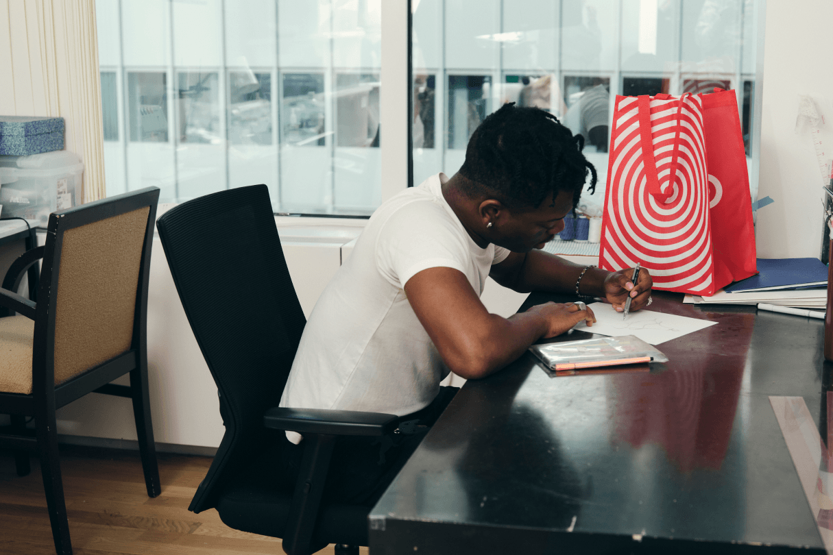 Taofeek Abijako Studio Life With Iconic Target Bag