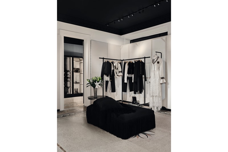 Minimalist interior of the new Ann Demeulemeester Paris flagship store at the Jardin du Palais Royal.