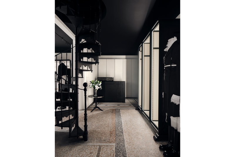Minimalist interior of the new Ann Demeulemeester Paris flagship store at the Jardin du Palais Royal.