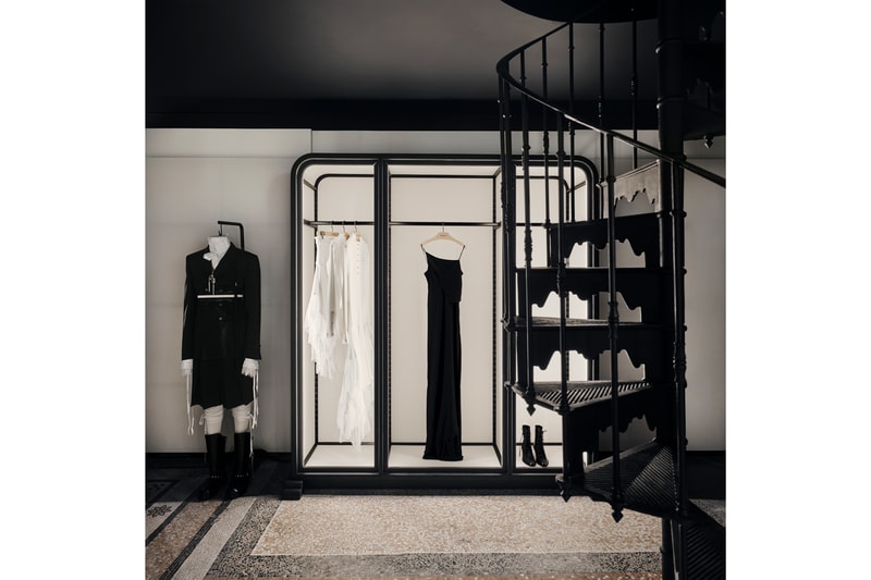 Minimalist interior of the new Ann Demeulemeester Paris flagship store at the Jardin du Palais Royal.