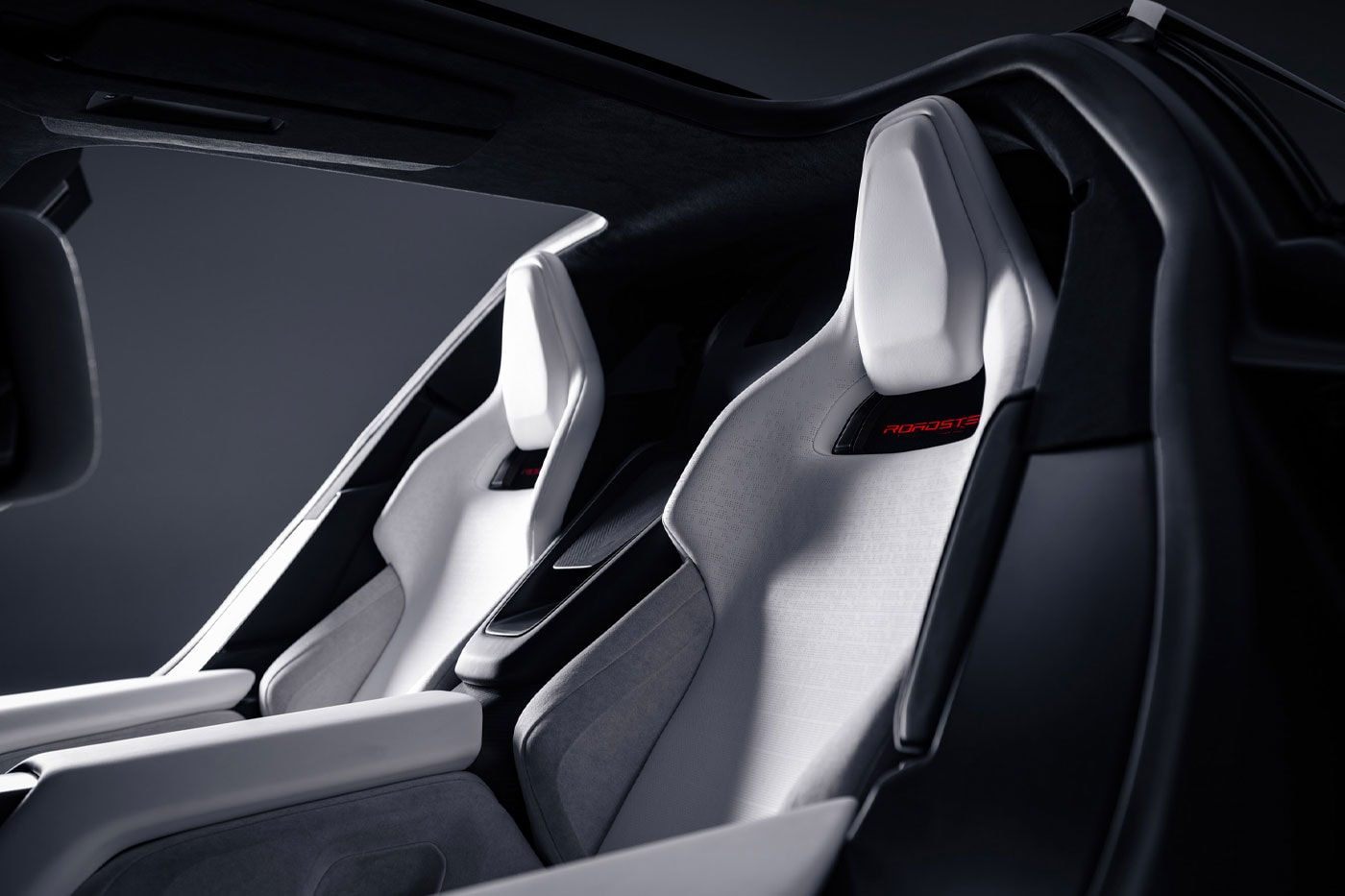 Tesla and SpaceX Put Thrusters on the Roadster so It Can Literally Fly elon musk electric vehicles backflips ramp upside down two-seat