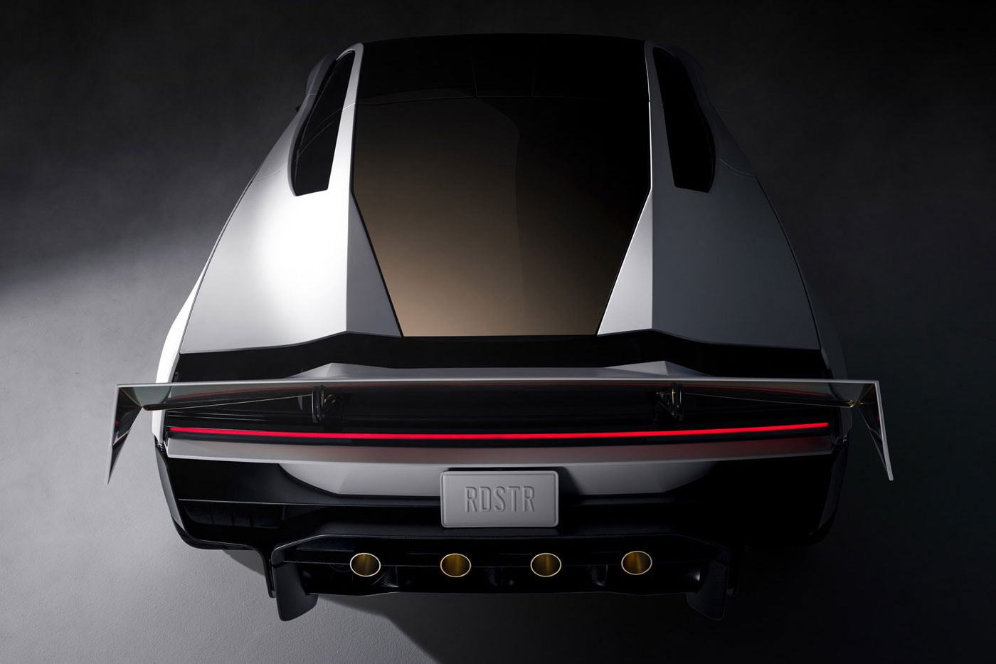 Tesla and SpaceX Put Thrusters on the Roadster so It Can Literally Fly elon musk electric vehicles backflips ramp upside down two-seat