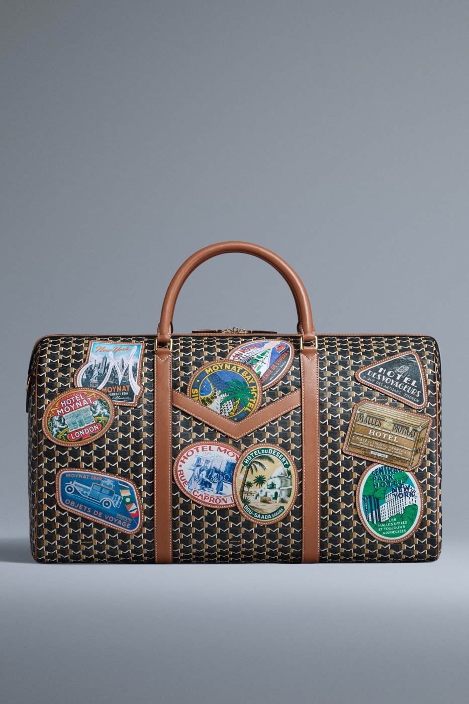 Bad Bunny's Styling Team Partners With Moynat for the 'Hotel Moynat' Collection