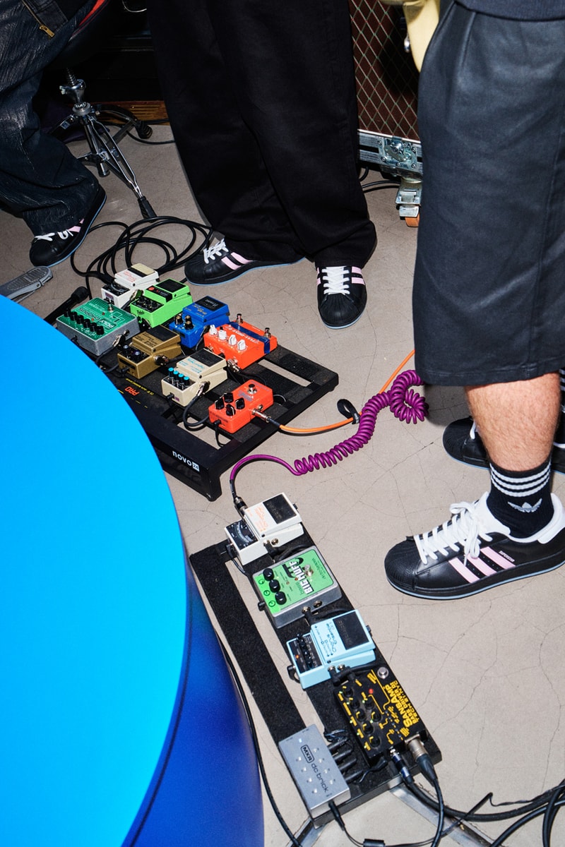 adidas jd villanelle elevator music set gene gallagher the original live battersea power station chimney lift band rock london live tracksuits t-shirts