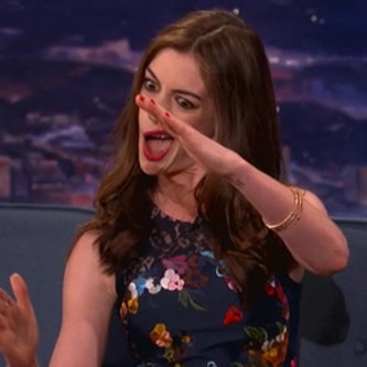 Anne Hathaway offers Lil Wayne-style paparazzi rap on Conan