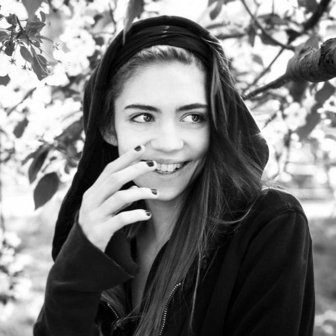 Hear Grimes' "Genesis" Supporting An Expedia Commercial