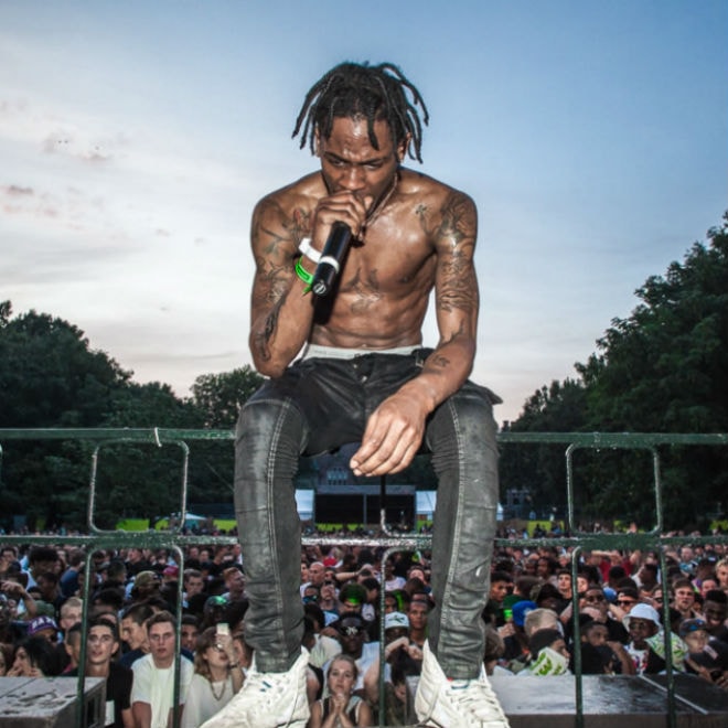 Travi$ Scott Brings Out Kanye West & Chris Brown to the Stage