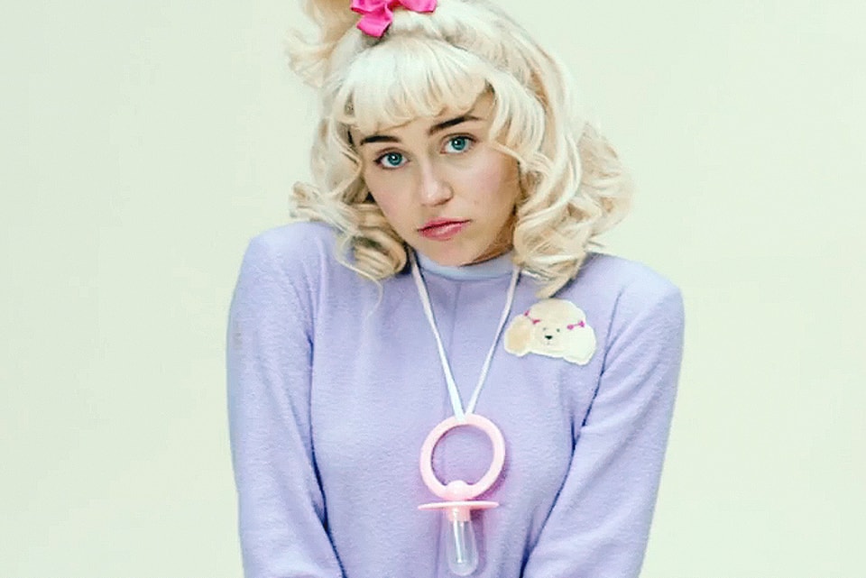 Miley Cyrus is a Baby in Her New Video for "BB Talk" .