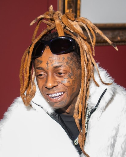 Lil Wayne Watched Skate Videos on his Phone at the Grammys Afterparty