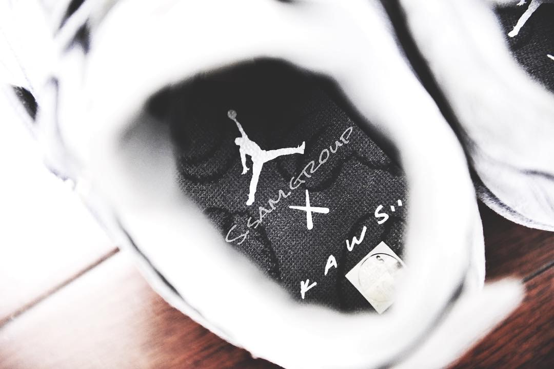 KAWS x Air Jordan 4 More Details