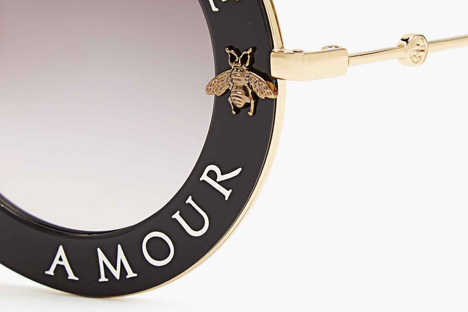 Gucci “L’Aveugle Par Amour” round-frame sunglasses