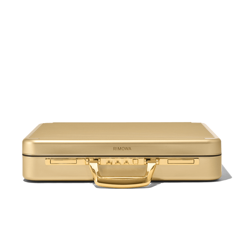 RIMOWA 推出全新 Attaché Gold 限量手提公事包