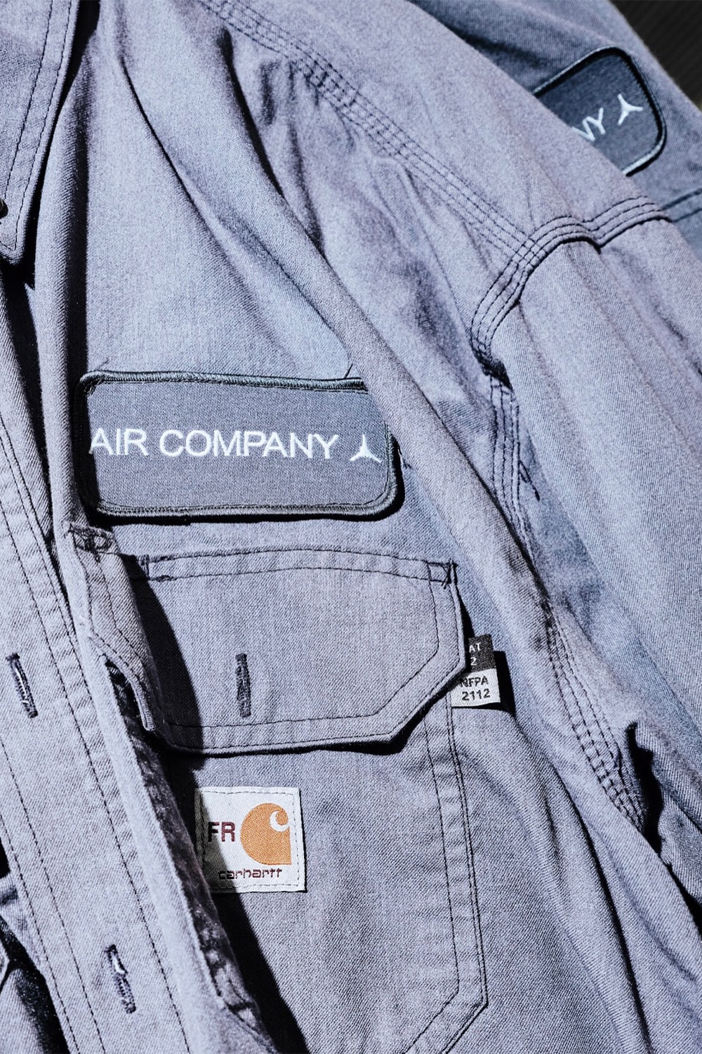 科學單位 Aircompany 曝光飾有 Carhartt Logo 工作服