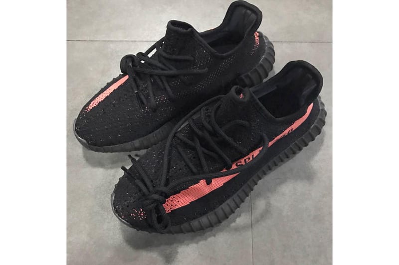 black yeezy with tan stripe