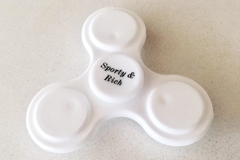 Emily Oberg Sporty & Rich Fidget Spinner