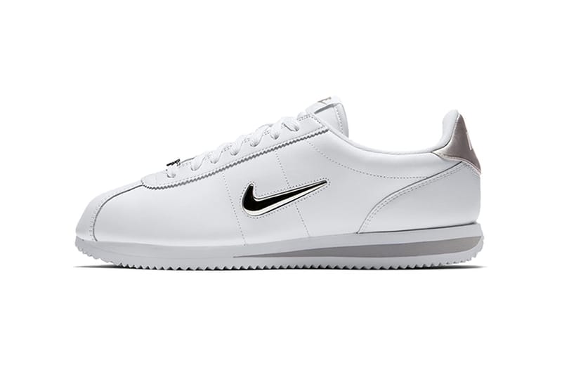 black and silver nike cortez