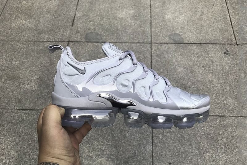 white and silver vapormax plus