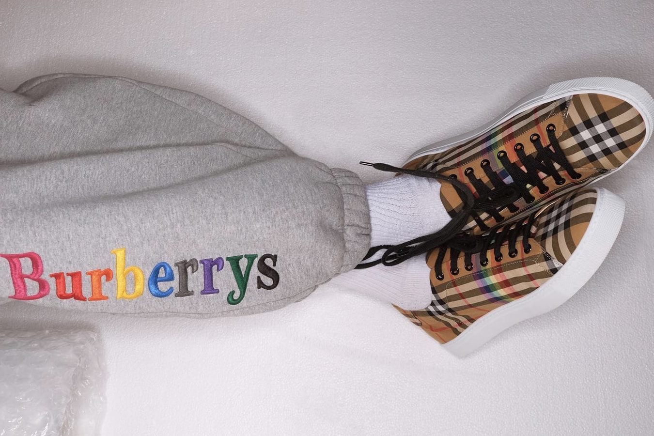 Burberry rainbow check tartan plaid sneakers burberrys embroidered sweat pants Christopher bailey lfw london fashion week where to buy
