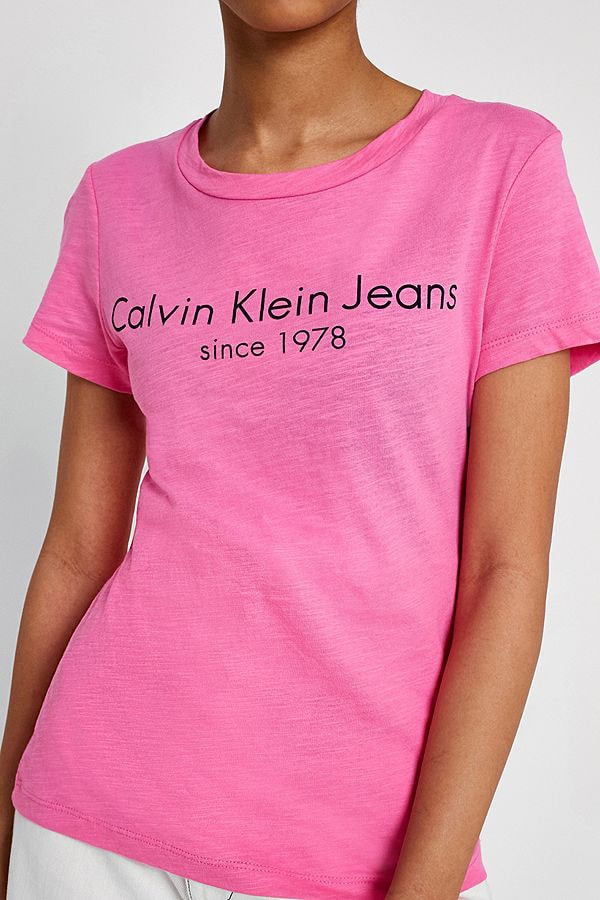 Calvin Klein minimal retro 90s pink logo t shirt cotton womens tee urban outfitters where to buy
