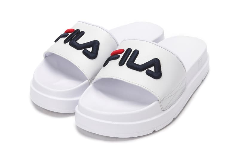 FILA logo millennial pastel pink platform slides drifter jacked up black white summer footwear where to buy