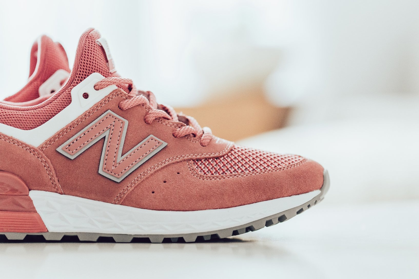 New Balance 574 Sports Dusted Peach Pink Rose Sneaker Close Up