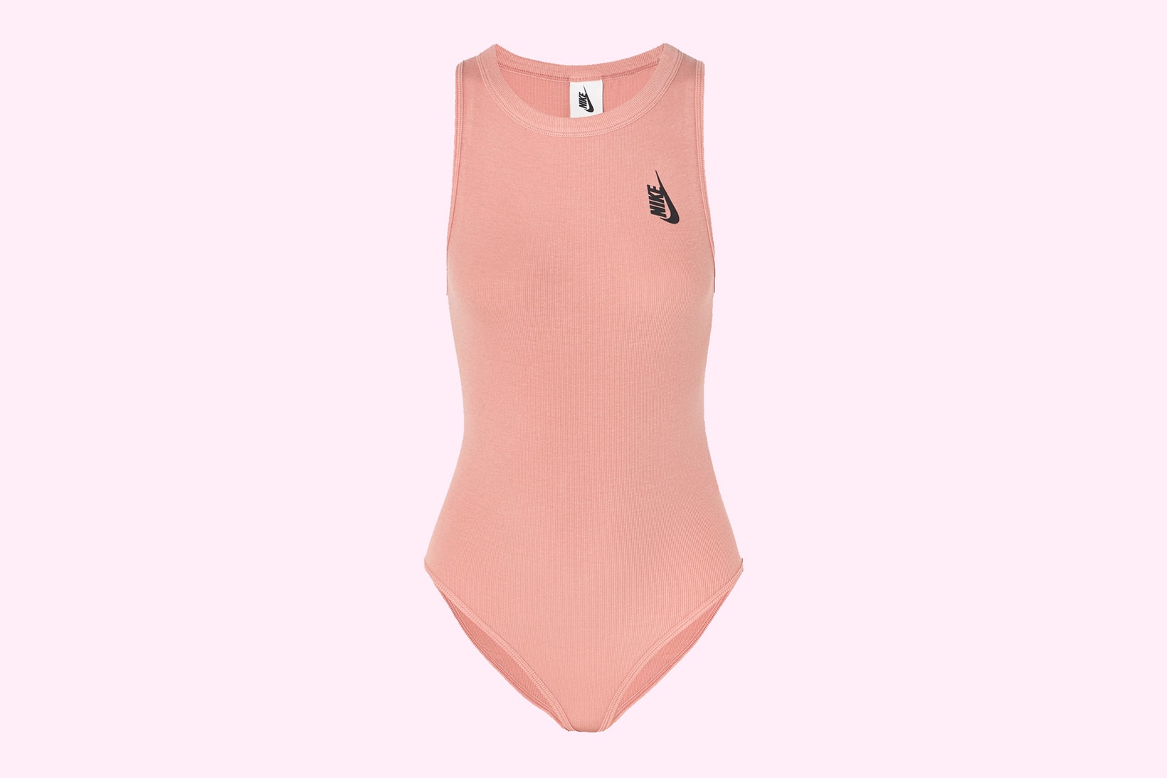 Nike womens bodysuit logo millennial pastel pink swoosh ribbed sportswear where to buy