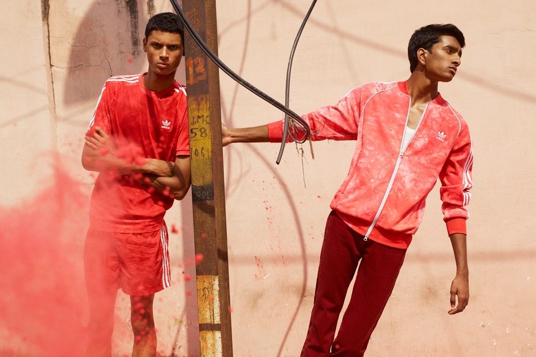 Pharrell williams adidas originals hu holi adicolor collection india hindu festival powder dye apparel stan smith tennis sneakers where to buy