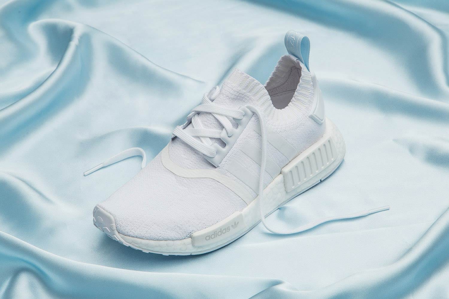 white and blue nmd