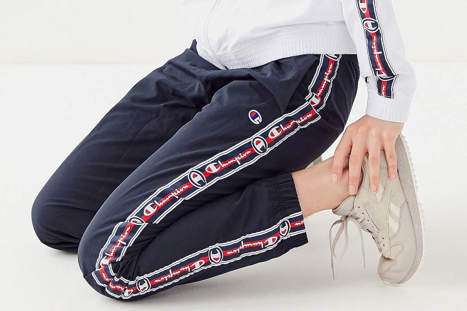 Champion's Logo Track Pants in White and Navy