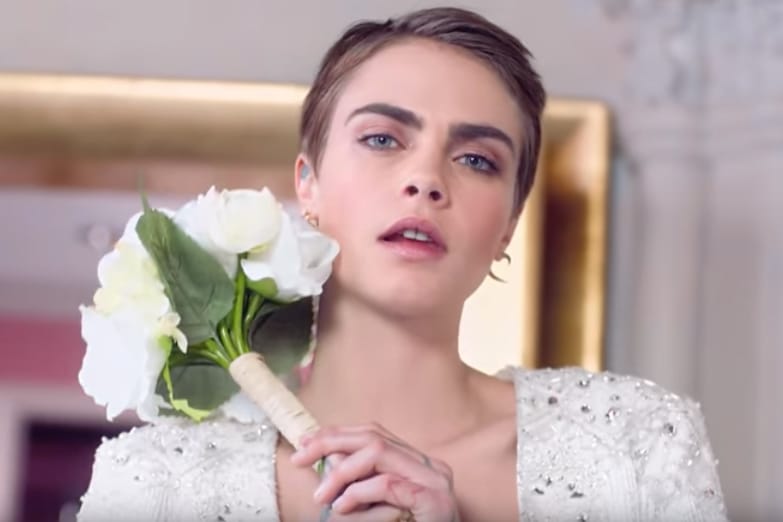 Cara Delevingne Tries on Wedding Gowns in the Latest British 'Vogue'