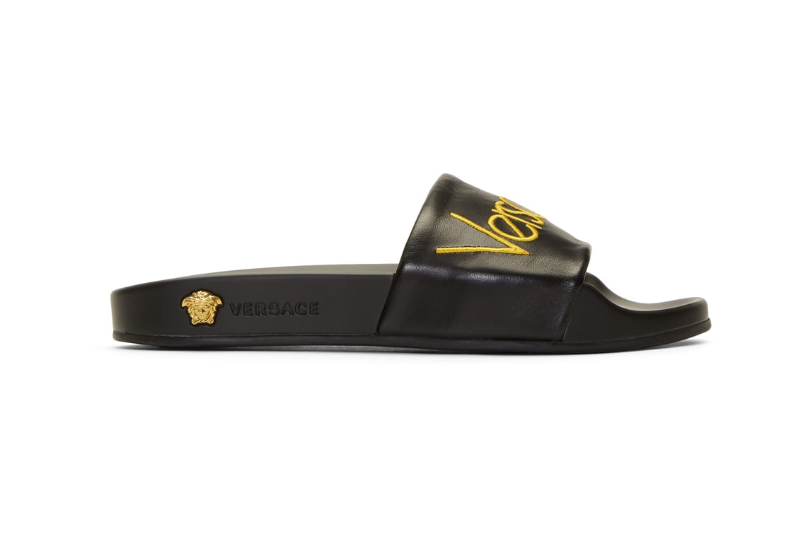versace black logo tribute slides leather yellow medusa gold hardware rubber sole