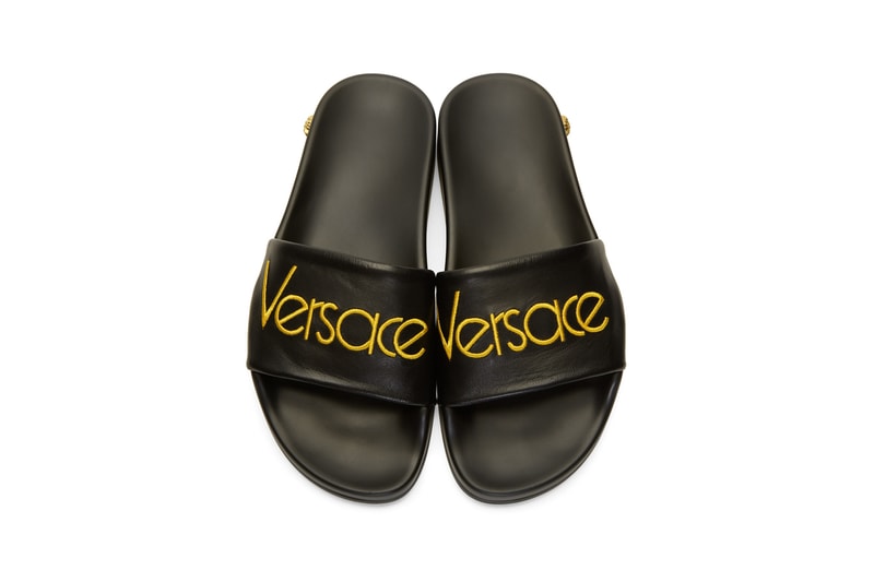 versace black logo tribute slides leather yellow medusa embroidery round toe rubber sole