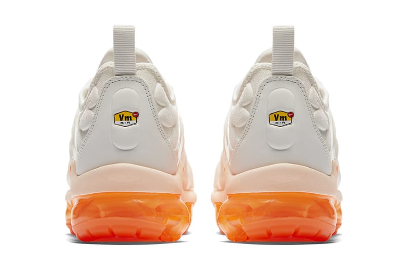 white and orange vapormax