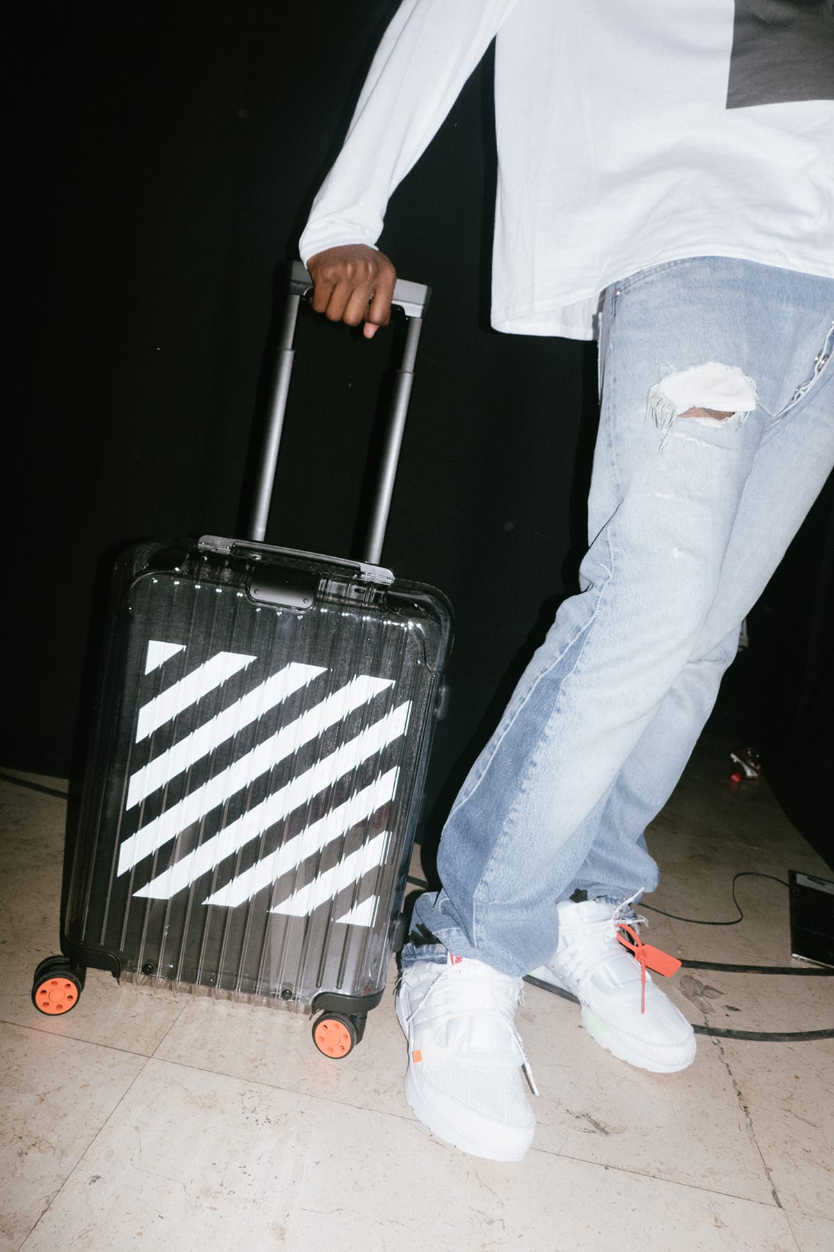 off white luggage bag