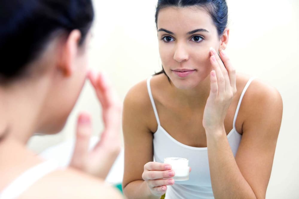 Girl Applying Skincare