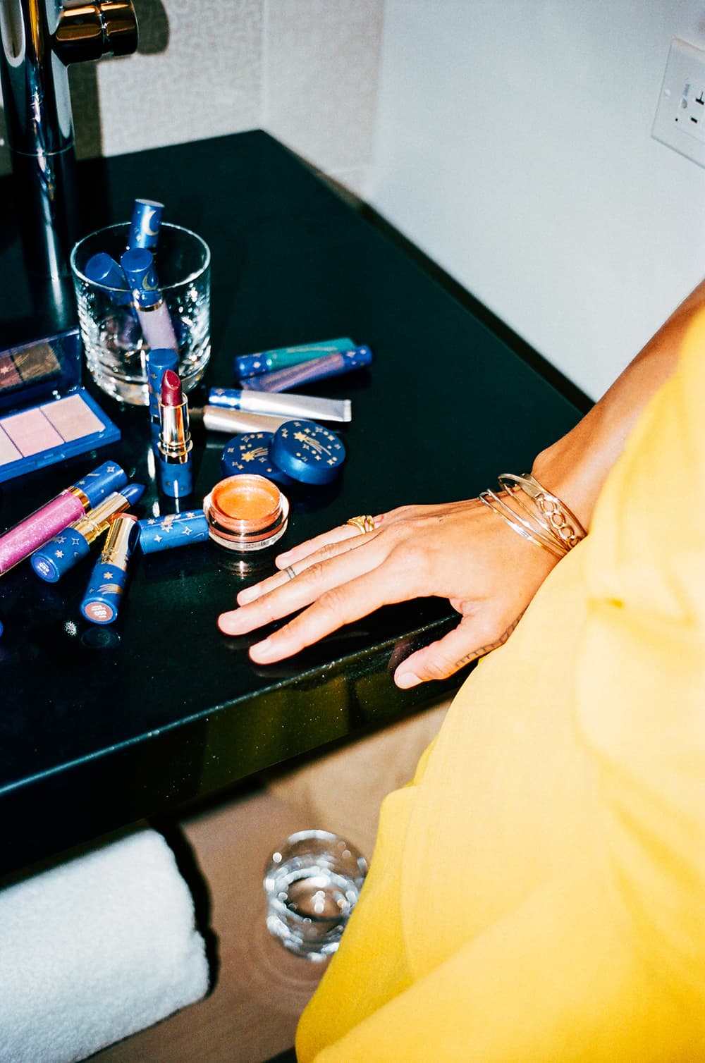 revlon shoot the moon makeup campaign lipsticks highlighter bathroom