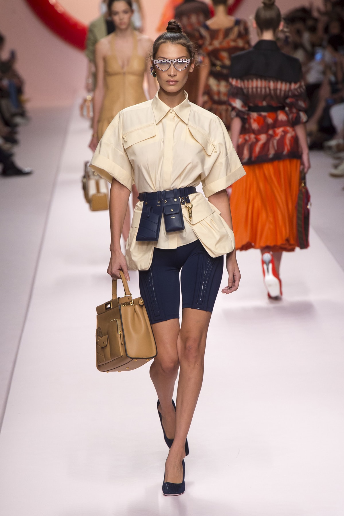 Fendi Karl Lagerfeld Spring Summer 2019 Milan Fashion Week Show Collection Bella Hadid Top Cream Biker Shorts Belt Bag Blue Handbag Khaki