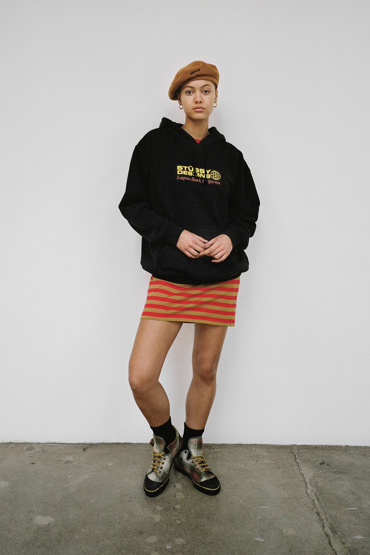 Stussy Women's Holiday 2018 Collection Lookbook Hoodie Black Skirt Red Beret Brown