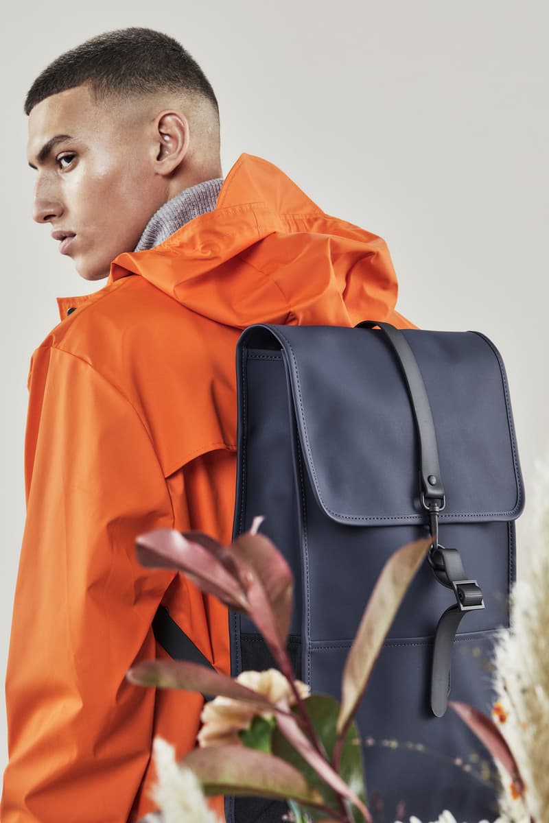 Rains Fall/Winter 2018 Campaign Long Jacket Fire Orange Backpack Black