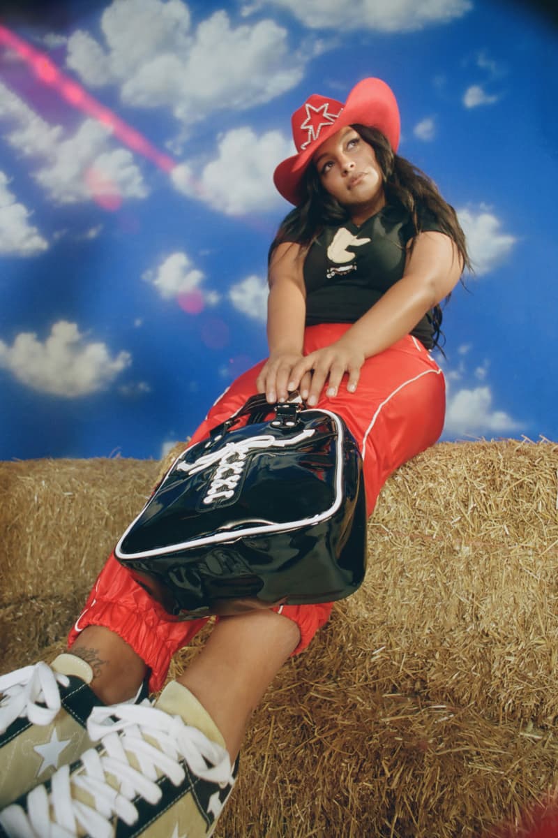 MadeMe x Converse Collaboration Paloma Elsesser One Star Tan Shirt Mini Bag Black Pants Red Campaign