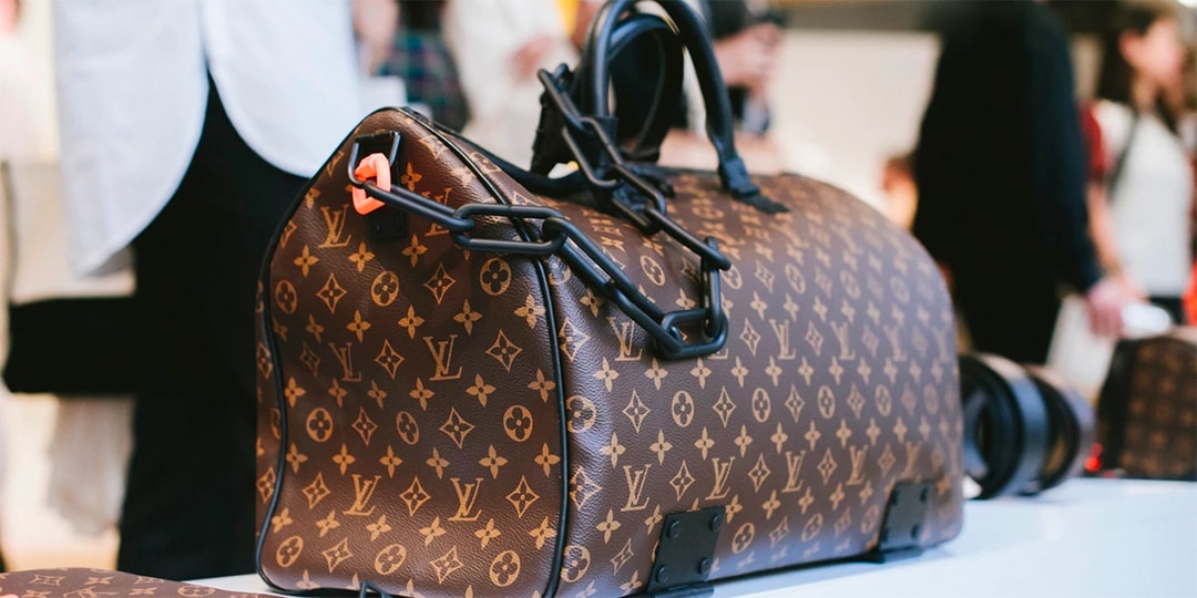 Louis Vuitton Sac Souple 55 Monogram Travel Bag Auction