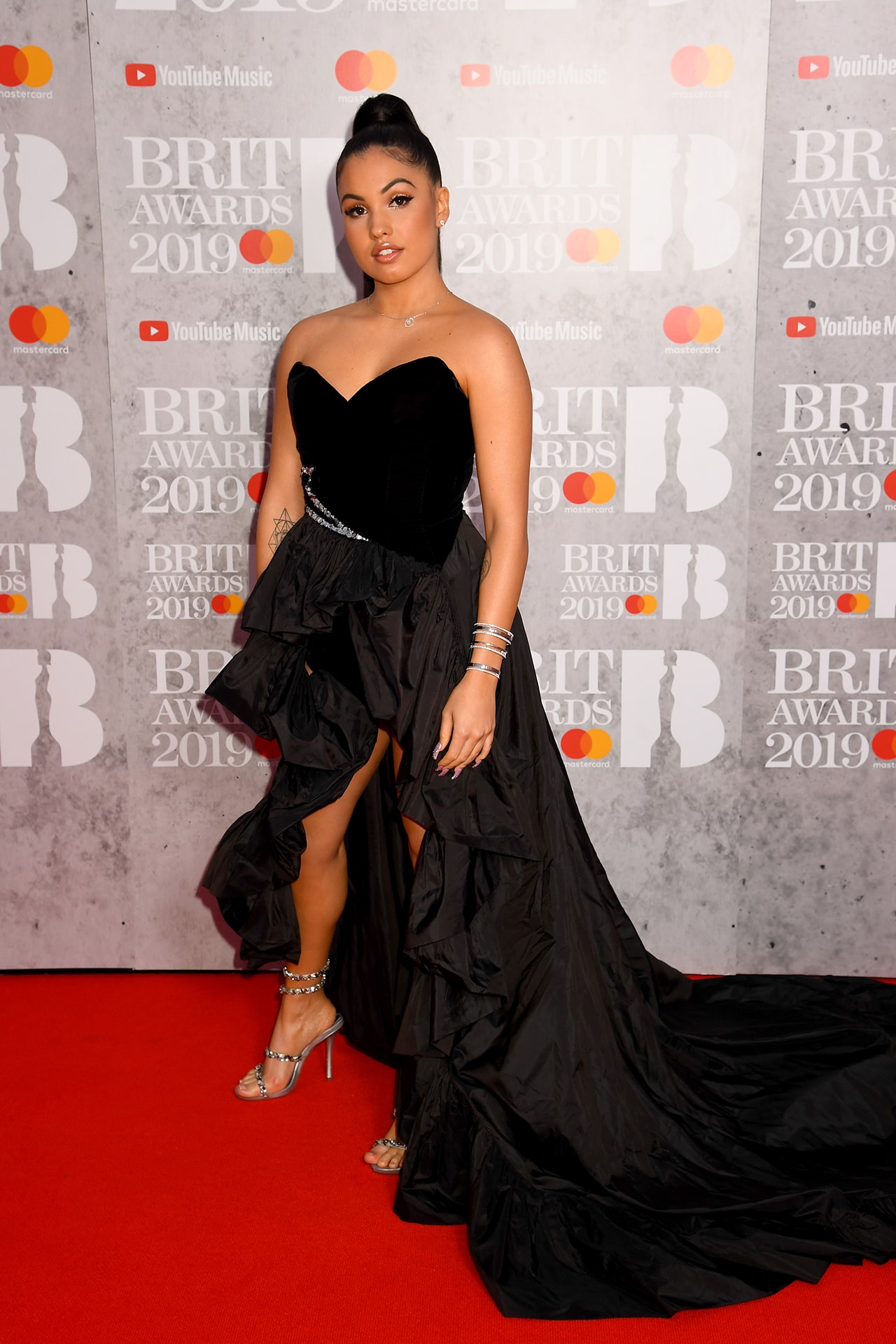 Mabel Mcvey Brit awards 2019 red carpet black dress gown