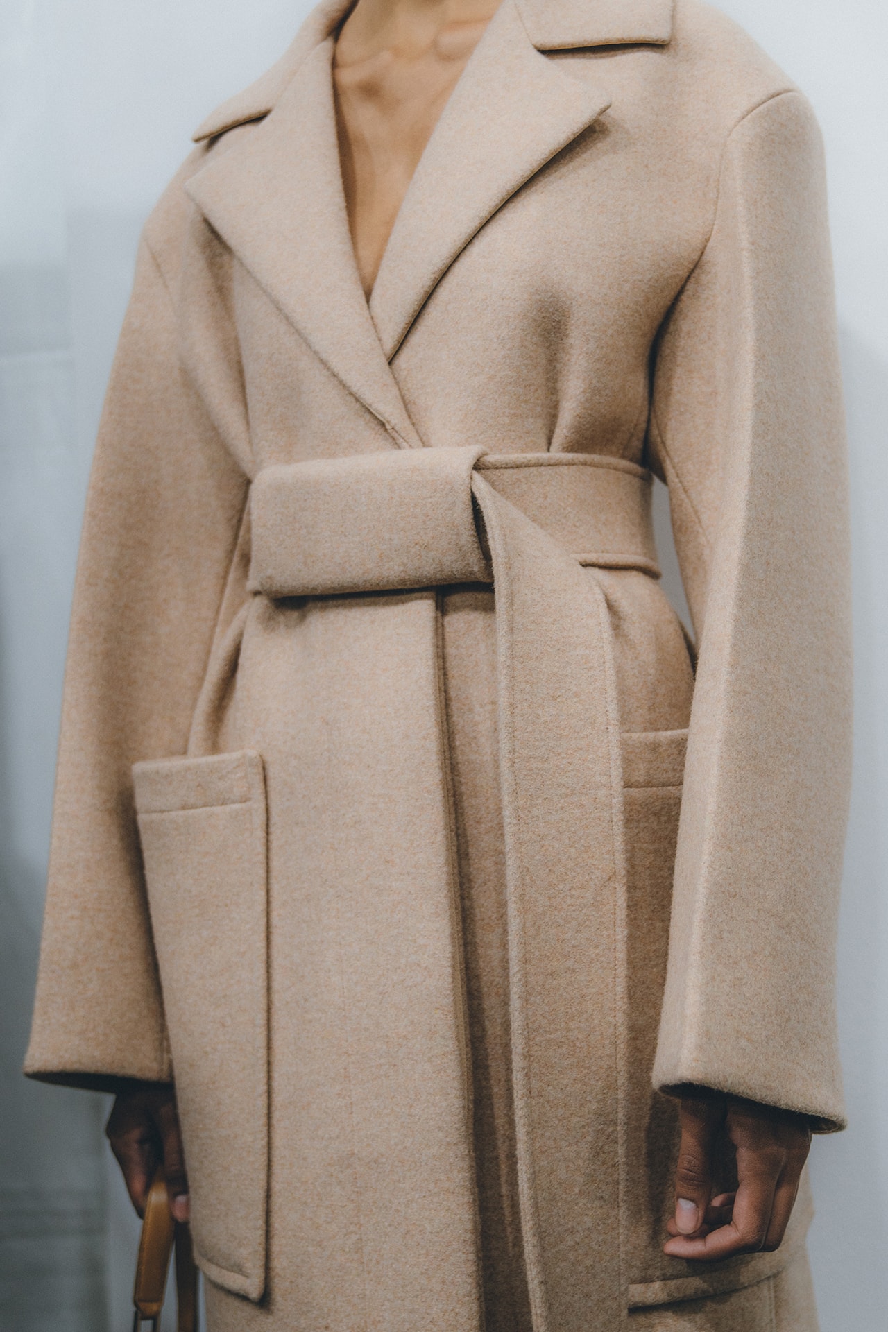 Jil Sander Fall Winter 2019 Runway Show Backstage Milan Fashion Week beige coat wrap camel