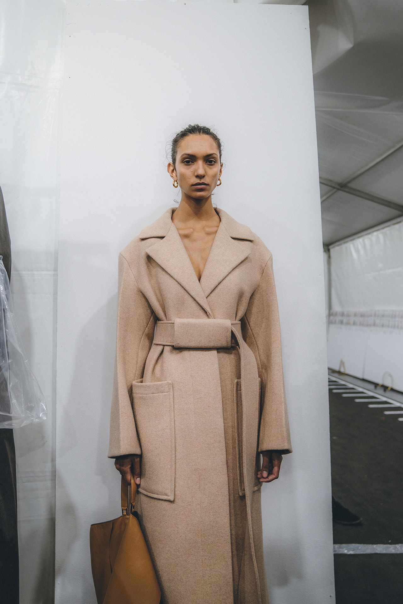 Jil Sander Fall Winter 2019 Runway Show Backstage Milan Fashion Week belted camel coat beige