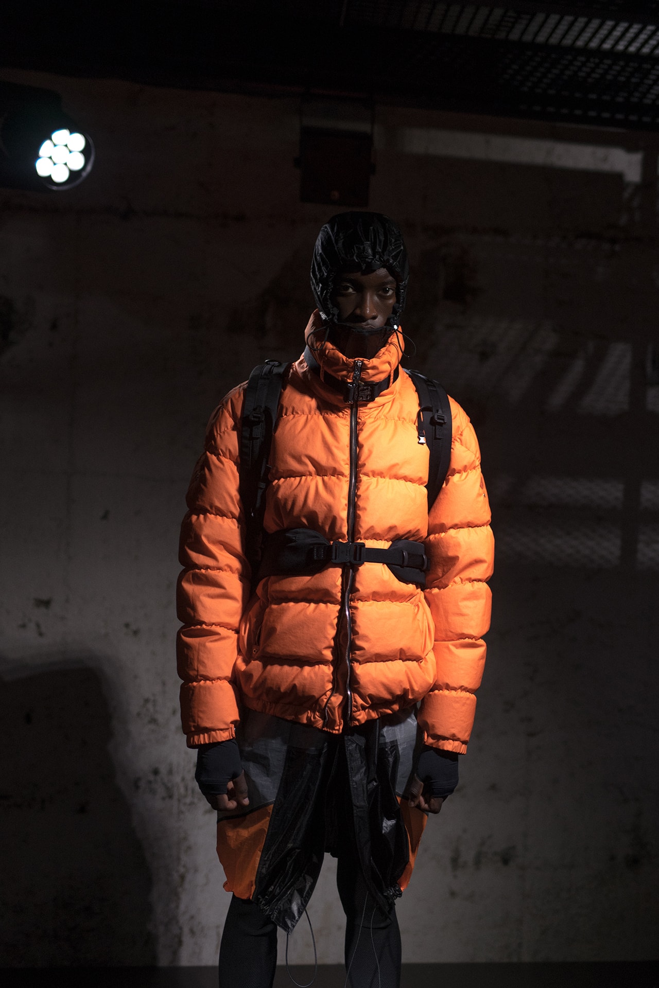 moncler genius milan fashion week presentation alyx matthew williams collaboration orange puffer jacket